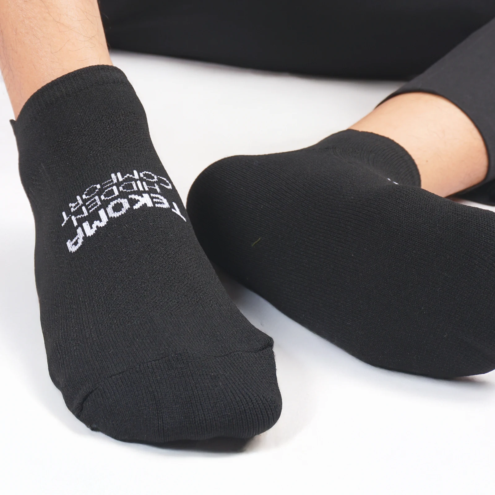 Knit detail of Tekoma Hidden Comfort in black, shown on foot