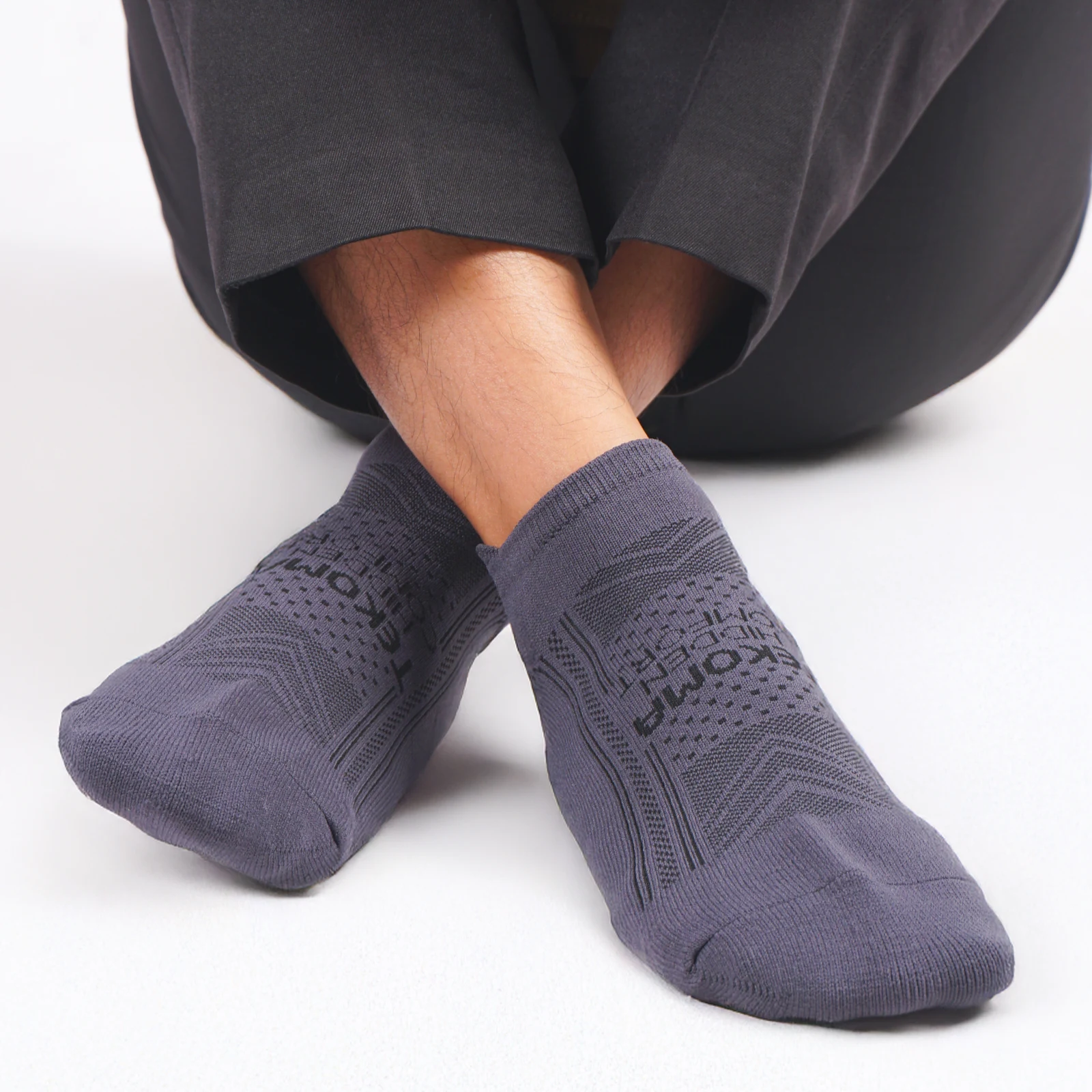 Tekoma Hidden Comfort in grey, worn in a seated pose