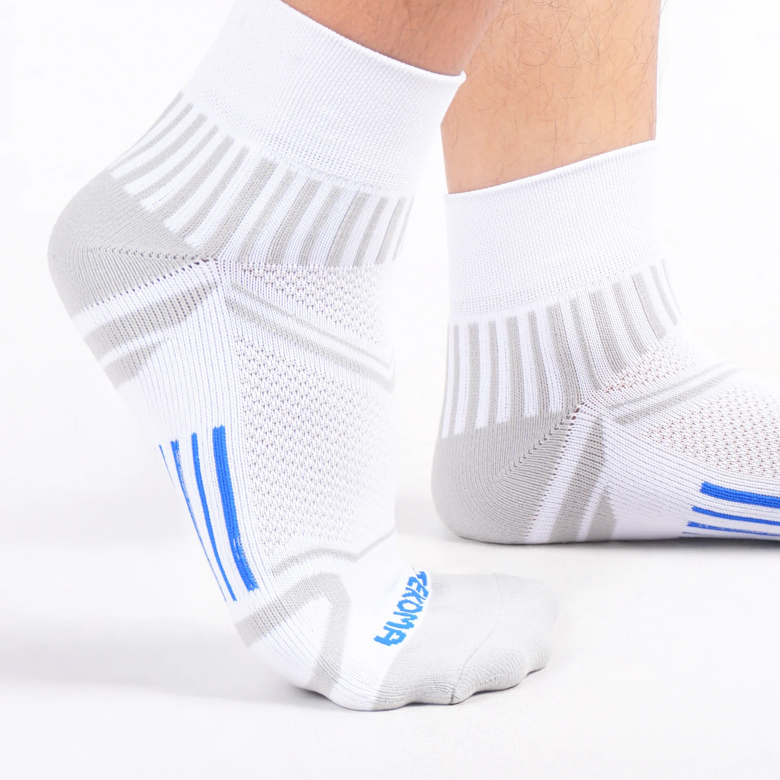 Knit detail of Tekoma Quarter Comfort in white, shown on foot
